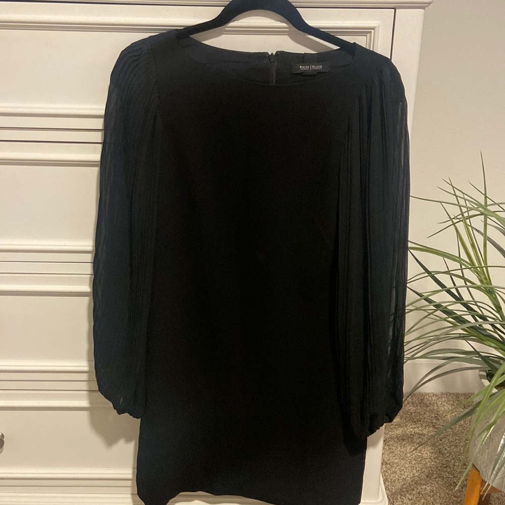 All black mini dress perfect for going out to dinner and business attire.